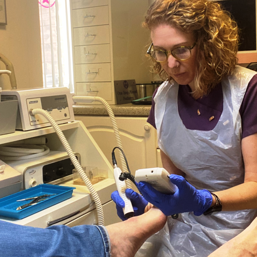Sarah Bradley treating a patient at One Step Ahead Podiatry Whitefield